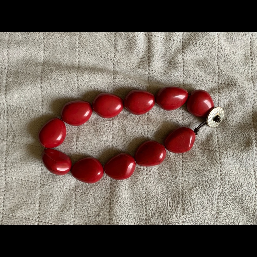 Chaps / Red beaded necklace